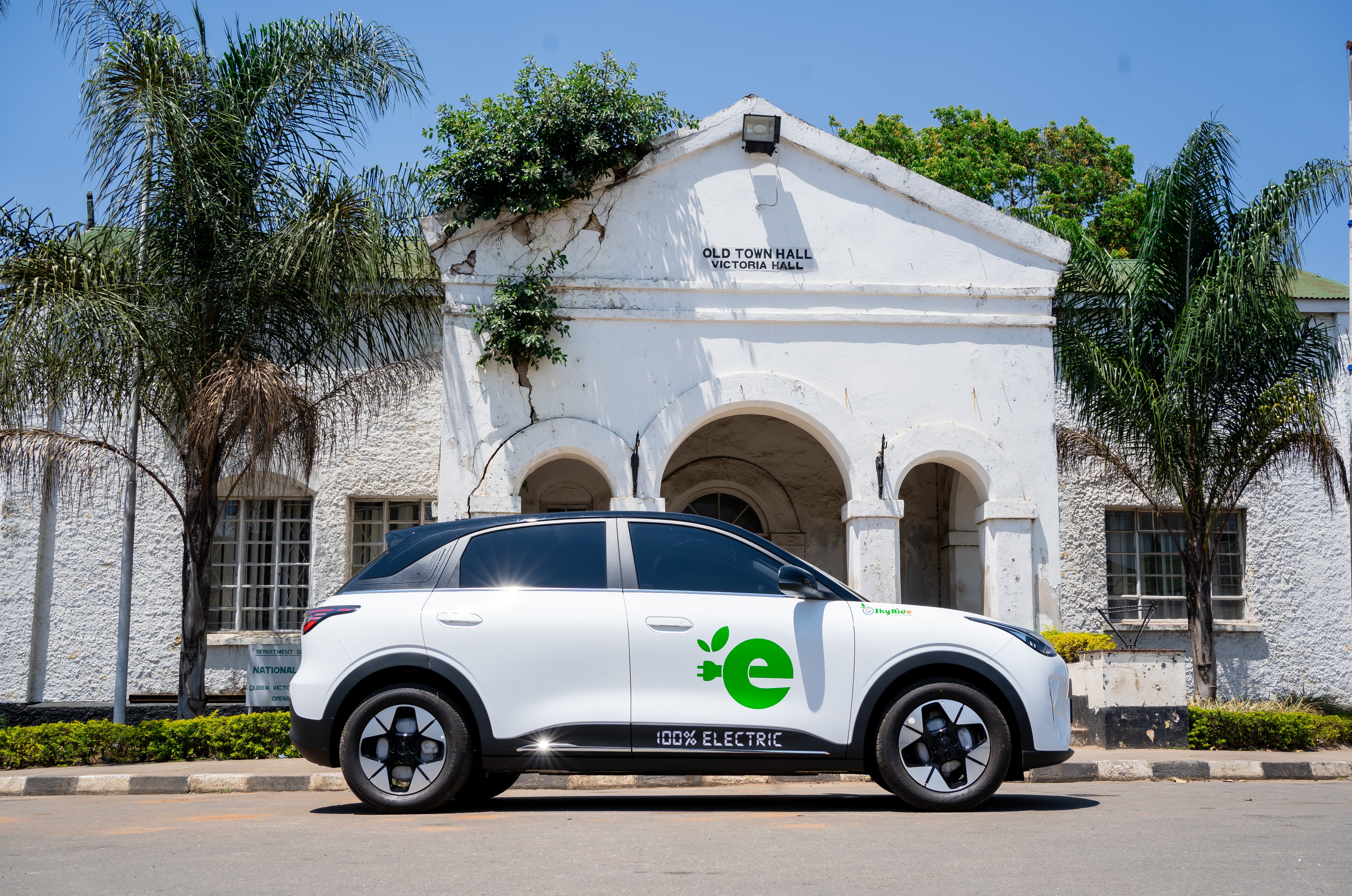 White Sky eRide 100% electric car parked outside the Old Town Hall